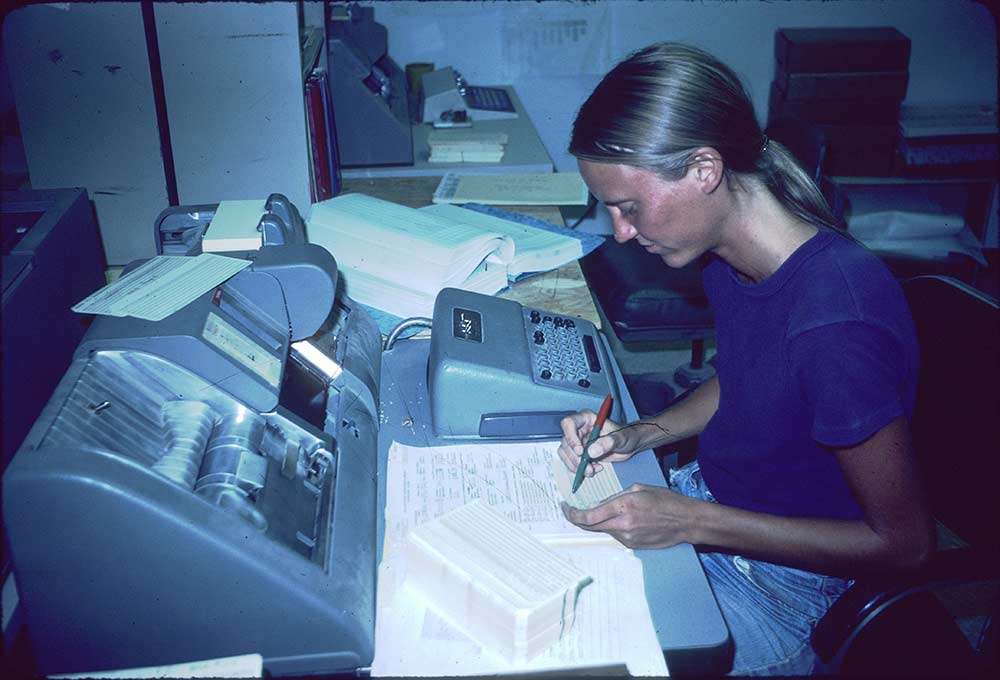 person keypunching cards